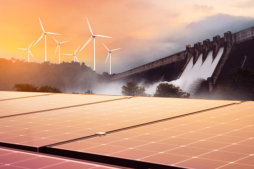 Renewable Energy Industry Promising Over 76,000 Jobs – Report 1 Electricity from solar panels, dams, and wind turbines. Environmentally-friendly renewable energy concept.