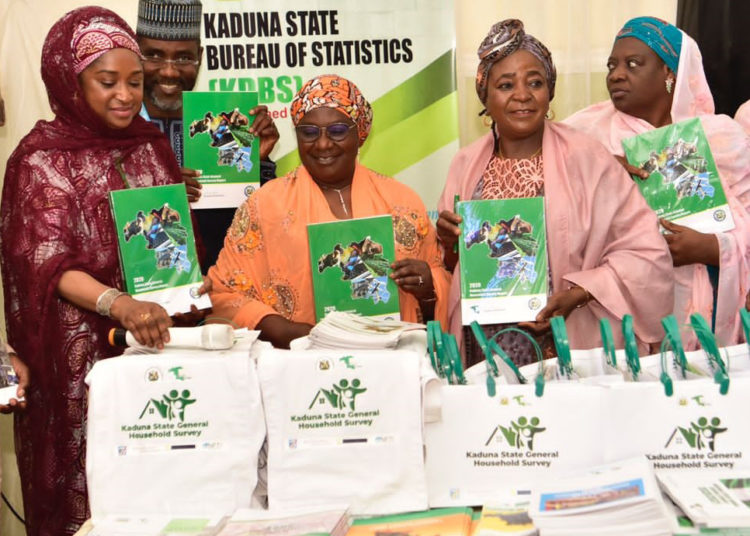 Acting Governor Dr Hadiza Balarabe and other senior government officials, holding copies of the 2020 Kaduna State General Household Survey