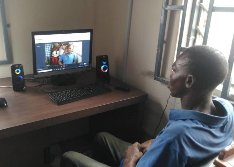 A sick patient being attended to using telemedicine channel in Benin City, Edo State.