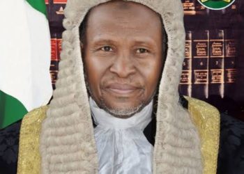 Buhari Praises Ex-CJN Muhammad, Honours Him With GCON National Honour 