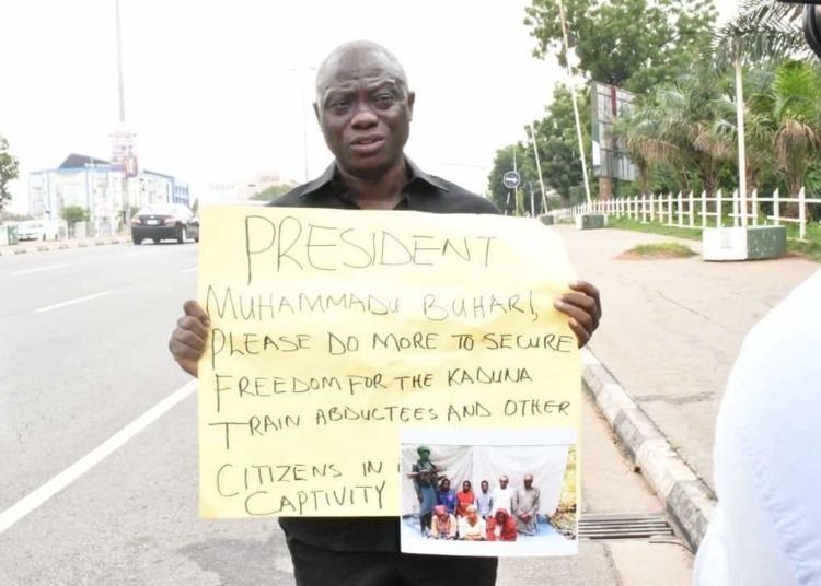 Member of the House of Representatives, representing Ede South/Ede North/Egbedore/Ejigbo federal constituency of Osun State, Hon. Bamidele Salam, on Wednesday, staged a one-man protest on the street of Abuja