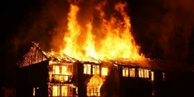 Neighbours Prevent Amputee From Jumping Into Burning House 1 burning house