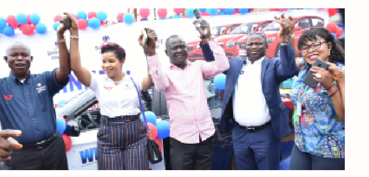 L -R: Regional sales director, South/West, Dangote Cement plc, Abayomi Shittu; marketing director Dangote Cement Plc, Funnmi Sanni, Star prize winner Akinnayajo Marcus Omotayo; national sales director, Dangote Cement plc Oluyemi Fajobi; head, National Lottery Regulatory Commission, Akure, Abegunde Foluke, during the star prize presentation in the ongoing Dangote Cement Bag of Goodies National Consumer Promo in Akure Ondo State, recently.