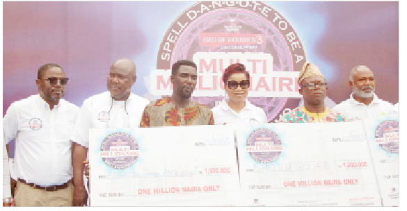 Dangote Cement Puts Smiles On Consumers’ Faces 1 L-R: Head logistics and distribution, Dangote Cement Plc, Michael Kehinde; regional sales director, South-West, Dangote Cement Plc, Tunde Mabogunje; Dangote Cement Promo winner, James Adepegba; national sales director, Dangote Cement, Funmi Sanni; Dangote Cement Promo winner, Shittu Ibitayo; and zonal director, National Lottery Regulatory Commission (NLRC), Fasunwomi Omotayo during the presentation of cheques to the winners in Ibadan