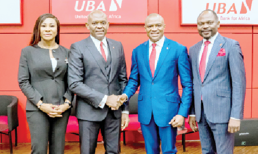 UBA Names Alabuwa As New GMD, Appoints DMD, Eds 1 L-R: New executive director, North Bank, Emem Usoro; group chairman, Tony Elumelu; new group managing director/CEO, Oliver Alawuba, and new deputy managing director, Muyiwa Akinyemi, during the corporate event to announce the appointments of new GMD and executive directors of UBA Group, at the Tony Elumelu Amphitheatre, UBA House, Lagos, yesterday