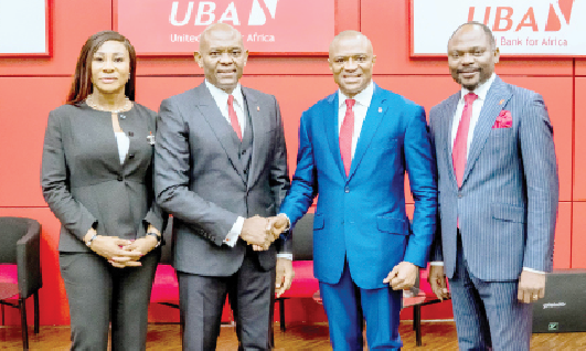 L-R: New executive director, North Bank, Emem Usoro; group chairman, Tony Elumelu; new group managing director/CEO, Oliver Alawuba, and new deputy managing director, Muyiwa Akinyemi, during the corporate event to announce the appointments of new GMD and executive directors of UBA Group, at the Tony Elumelu Amphitheatre, UBA House, Lagos, yesterday