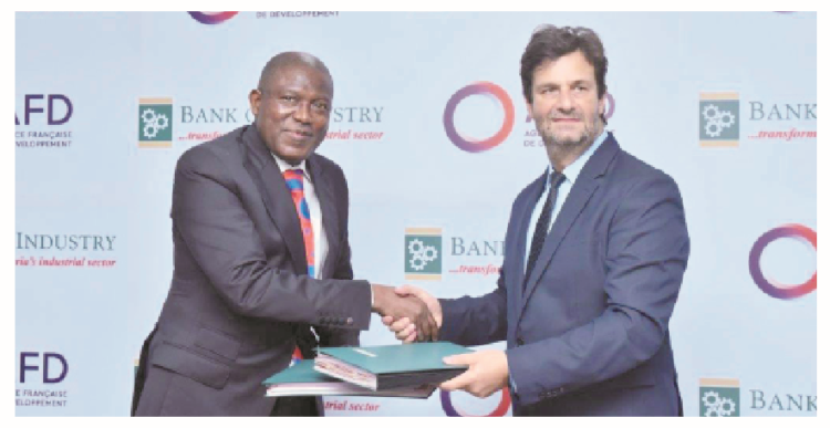 L-R : Managing director, Bank of Industry (BOI), Olukayode Pitan and country director, French Development Agency (AFD), Xavier Muron at the BOI/AFD 100 Million Euro Line of credit agreement signing ceremony which took place at the BOI head office in Lagos, yesterday. PHOTO BY KOLAWOLE ALIU