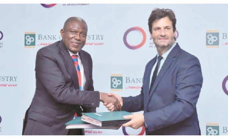 L-R : Managing director, Bank of Industry (BOI), Olukayode Pitan and country director, French Development Agency (AFD), Xavier Muron at the BOI/AFD 100 Million Euro Line of credit agreement signing ceremony which took place at the BOI head office in Lagos, yesterday. PHOTO BY KOLAWOLE ALIU