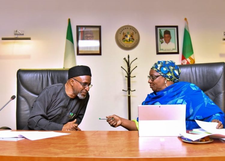 Acting Governor, Dr Hadiza Balarabe,  conferring with Malam Balarabe Abbas Lawal, Secretary to Kaduna State Government, during the State Executive Council meeting which held at the Council Chambers of Sir Kashim Ibrahim House