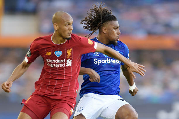 EPL: Iwobi Wants Longer Everton Stay 1 LIVERPOOL, ENGLAND - JUNE 21: Alex Iwobi of Everton and Fabinho (L) during the Premier League match between Everton and Liverpool at Goodison Park on June 21 2020 in Liverpool, England. (Photo by Tony McArdle/Everton FC via Getty Images)