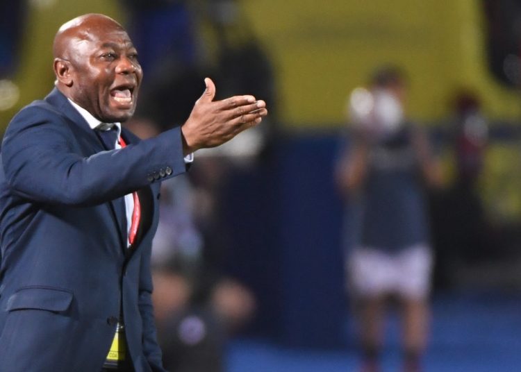 Tanzania's coach Emmanuel Amunike reacts during the 2019 Africa Cup of Nations (CAN) football match between Senegal and Tanzania at the 30 June Stadium in Cairo on June 23, 2019. (Photo by Khaled DESOUKI / AFP)