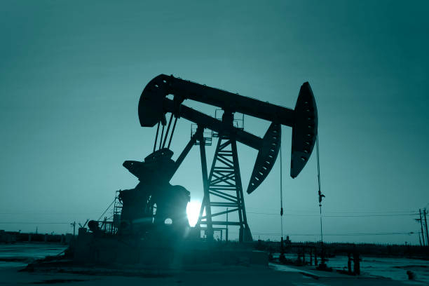 Energy Prices To Face Uncertainties In 2023 1 In the evening, the outline of the oil pump