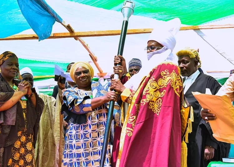 Dr Hadiza Balarabe, Deputy Governor of Kaduna state, presenting staff of office to His Highness, the Emir of Kauru, Alhaji Ya’u Shehu Usman