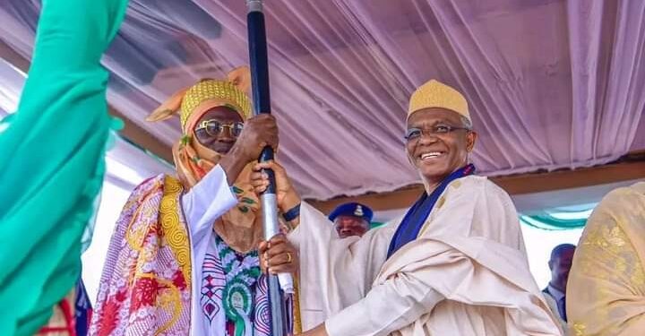 Governor Nasir El Rufai of Kaduna state, presenting the staff of office to His Highness Isyaku Yari, the Etsu Chikun, at Kakau, on Wednesday, October 5th, 2022.