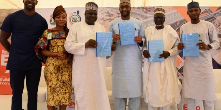 From left: Joseph Ike, Co-Founder, Fasaha Café; Sharon Itua, Program Officer, Kaduna Capital Territory Authority;  Chief Ishaya Idi, 1st Deputy President,  Kaduna Chamber of Commerce, Industries, Mines and Agriculture;Alhaji Suleiman Aliyu, President, KADCCIMA, Malam  Muhammad Hafiz Bayero, Administrator, Kaduna Capital Territory Authority; Mr  A’aron John, Director of Business and Commercial Services, Kaduna Capital Territory Authority,  after signing the MoU on Kaduna Film Village