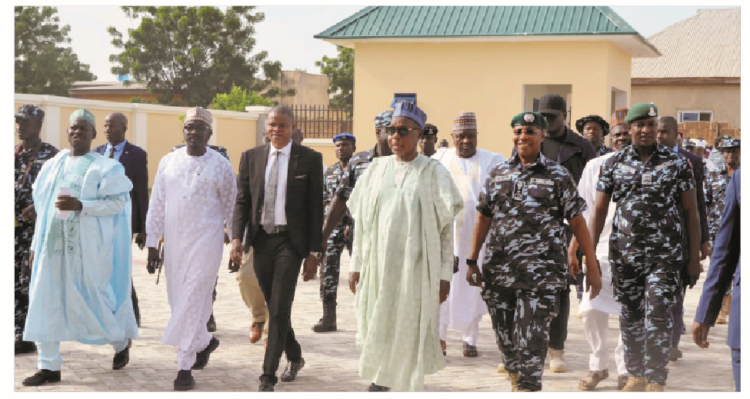 Governor Aminu Bello Masari (middle) alongside Inspector General of Police, Alkali Idris Baba during the commissioning of Zone 14 Police Headquarters in Katsina State.