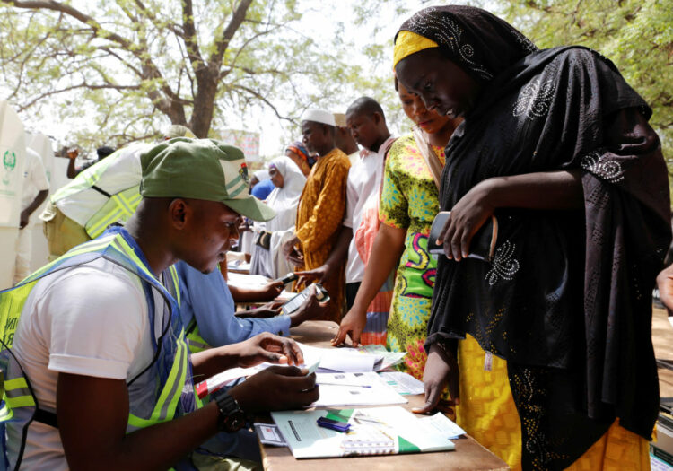 People arrive to cast their votes during Nigeria's presidential election at a polling station in Yola, Adamawa State, Nigeria February 23, 2019.      REUTERS/Nyancho NwaNri - RC1B303BF090