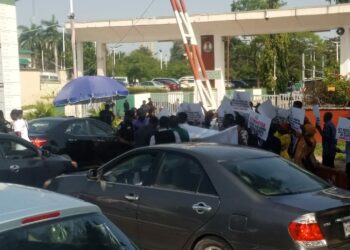 COVID-19 Contractors Barricade FCTA Gate Over Non-payment