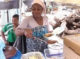 FCTA Evicts Illegal Food Vendors, Mechanics Near Presidential Villa 1 food seller jpg