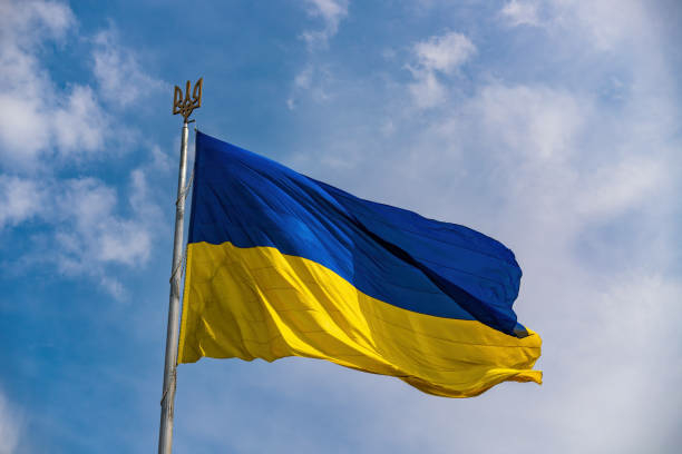 Ukrainian Delegation Heads To Nigeria For Economic Opportunities 1 Ukrainian national official flag on flagpole waving in the wind on picturesque blue sky background