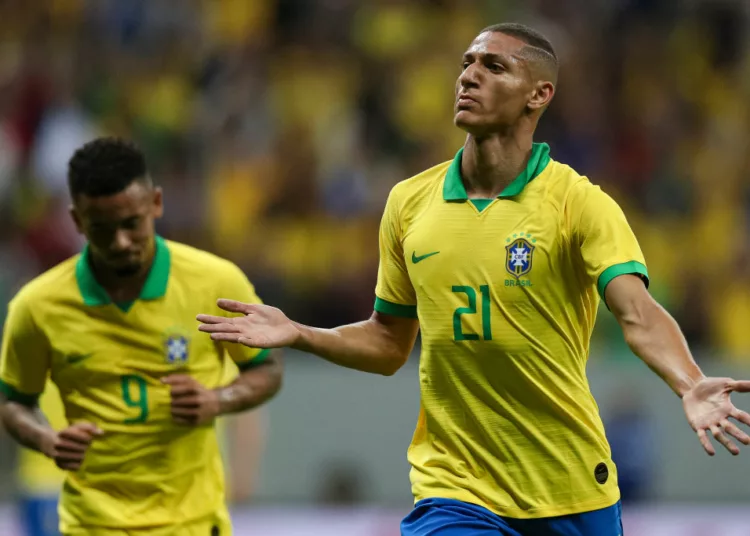 BRASILIA, BRAZIL - JUNE 05: Richarlison (R) of Brazil celebrates after scoring the opening goal during the International Friendly Match between Brazil and Qatar at Mane Garrincha Stadium on June 5, 2019 in Brasilia, Brazil. (Photo by Buda Mendes/Getty Images)