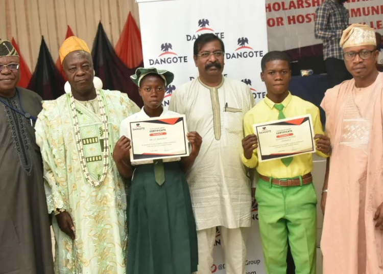 Dangote Refinery Contributing To Educational Devt In Host Communities 1 L-R: General manager, Human/ Admin, Dangote Fertiliser, Olusegun Basorun; Baale of Magbon Segun / chairman of Baale in Ibeju- Lekki, Chief Mufutau Dauda; one of the beneficiaries/student of Community High School Lekki, Bello Shakirat; group executive director, Strategy, Capital Projects & Portfolio Development, Dangote Industries Ltd, Devakumar Edwin; beneficiary from Community Senior High School, Magon Segun, Ajangboju Moruff and secretary Lekki LCDA, Hon. Tosin Osunnuga, who represented the chairman of Lekki LCDA, at the 2022 Scholarship award to qualified secondary and tertiary students of the host communities Youths of the Dangote Refinery and Fertiliser Projects Lekki Lagos, yesterday.