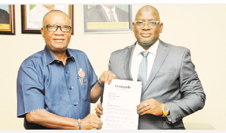 L-R: Vice chairman, LEADERSHIP Group Ltd, Mike Okpere, presenting  nomination letter for LEADERSHIP Public Service Person of the Year 2022 award to chairman of Federal Inland Revenue Service (FIRS), Muhammad Mamman Nami, at the FIRS headquarters, Abuja, on Thursday.