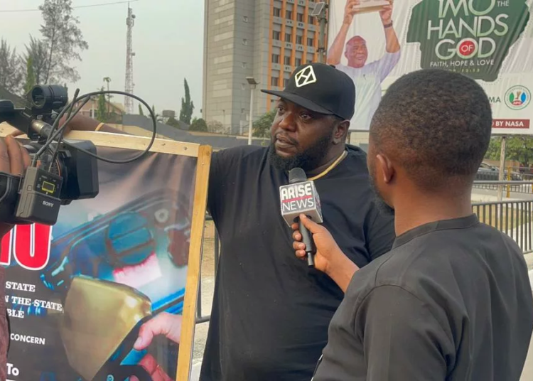 Imo Activist In Lone Protest At Gov't House Over Fuel Price Hike 1 WhatsApp Image 2023 01 13 at 13.44.19 jpeg