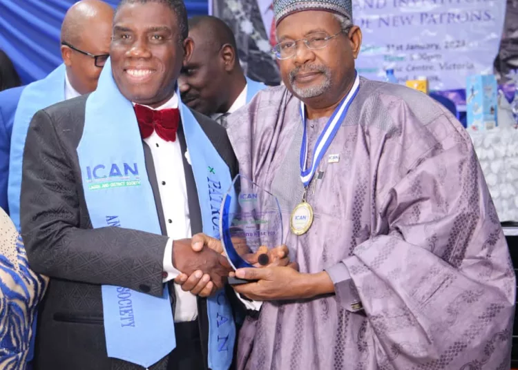 L-R: Group managing director/CEO, Cornerstone Insurance Plc, Mr. Ganiyu Musa, receiving a plaque as the Patron of the Institute of Chartered Accountants of Nigeria (ICAN) Lagos and District Society from the 58th president of ICAN, Mallam Tijjani Musa, in Lagos, recently.