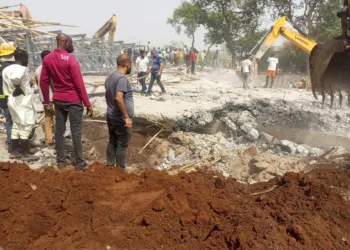 2 Die, Many Trapped In Abuja Building Collapse