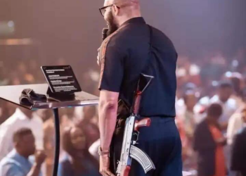 Police To Probe Abuja Pastor With AK-47 On Altar, Says FPRO