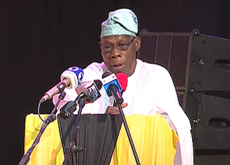 Former President Olusegun Obasanjo speaking at the event.