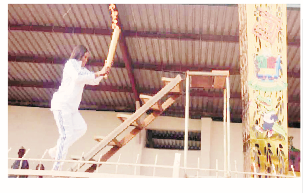 Why We Are Organising Bayelsa’s Maiden Sports Festival – Diri 1 Tokyo Olympic silver medalist, Blessing Oborodudu, lighting the Bayelsa Sports Festival torch