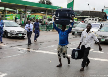 Passengers Trek To Catch Flight As Unions Ground Airports
