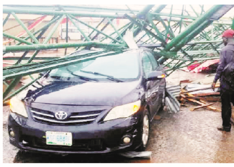 The car occupied by two residents who escaped death during a rainfall that was accompanied by a rainstorm in Ilorin, Kwara State.