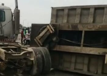 Container-laden Truck Falls Over, Kills Cart Pusher In Lagos