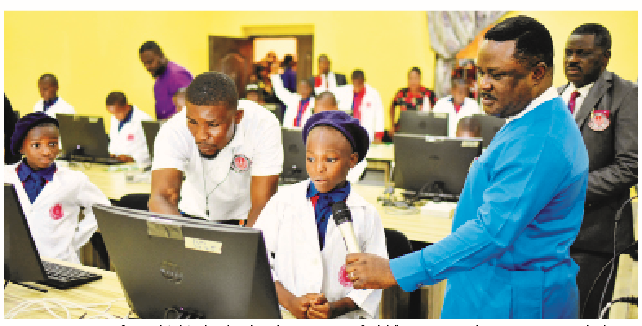Ayade Commissions Multi-billion Naira Smart Teachers’ Institute 1 Cross River State governor, Prof Ben Ayade(right), with students during the commissioning of multi-billion Naira Smart Teachers Training Institute in Biase local government area, yesterday.