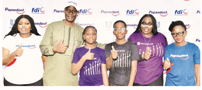 Pepsodent School Activation Targets Children To Promote Dental, Oral Health Education 1 L-R: Category manager, Oral Care, Unilever Nigeria, Eva Ogudu; chairman, Nigerian Dental Association, Lagos chapter, Dr Oluwole Olusanya; a pupil of St Saviour Nursery/Primary School, Tinuola Badmus; another pupil, Sitonna Emodi; head teacher, St Saviour Nursery/Primary School, Lawrencia Izedonmwen and business lead, Beauty & Personal Care, Unilever Nigeria, Oiza Gyang, during the launch of the Pepsodent School’s programme held in Lagos, yesterday.