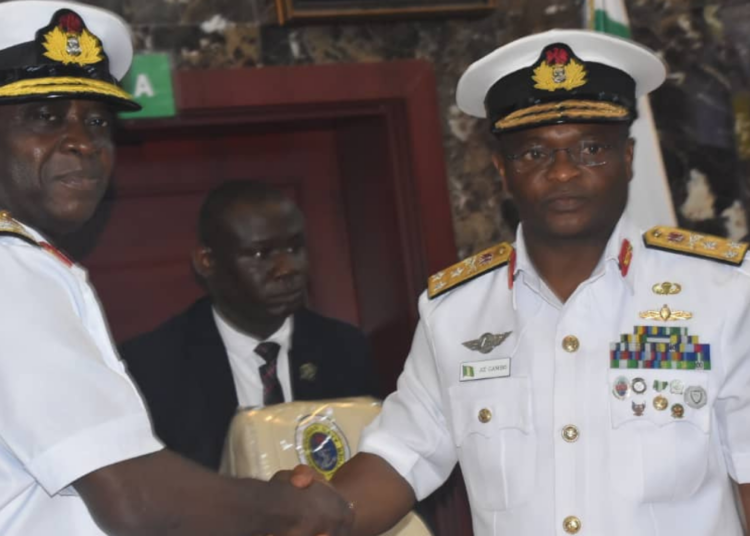 L-R: New CNS, Rear Admiral Emmanuel Ogalla and outgone CNS, Rear Admiral Auwal Gambo (rtd), at the handing-over ceremony in Abuja, on Friday.