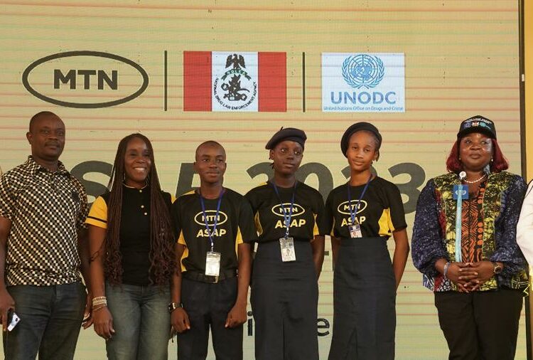 From L-R: Secretary, National Drug Law Enforcement Agency (NDLEA), Shadrach Usman Haruna; Teacher, PTA/NADP International College, Lafia, Nasarawa State, Jonah Basil-Eneh; Executive Secretary, MTN Foundation, Odunayo Sanya; Students, PTA/NADP International College, Lafia, Nasarawa State, Abdul Isa Salihu, Peace Monday and Augusta Opane Okyuwa; National Programme Officer, United Nations Office on Drugs and Crime (UNODC), Folusho Ajayi Adelekan and Associate Professor, Theatre Arts, University of Abuja at the ASAP quiz competition grand finale where PTA/NADP International College, Lafia emerged winners in Abuja on June 23, 2023.