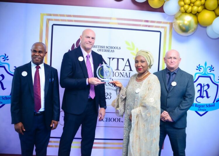 L- R; Head of Assessment  Mr. Akin Alufa, Headmaster, Mr. Labuschagne, Proprietress, Mrs Amsa AbdulRazaq, and Senior Teacher, Mr Joe Dyer , at the presentation of the British School Overseas ( BSO) Inspection Report that awarded The Regent School, Abuja outstanding in all categories, the first and only school in West Africa to achieve this feat.