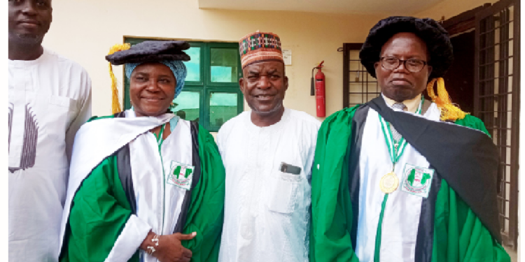 ANPA Board of Trustees Member, and Dean, Faculty of Social Sciences National Open University Nigeria, Professor Kamal Bello (middle), flanked by ANPA awardees and new fellows, (left) Director Ministry of Works and Housing, FCT, Hajiya Aisha Ndayako, and (right) Commissioner, Revenue Mobilization Allocation & Fiscal Commission, FCT, Ambassador Ayuba Jacob Ngbako.