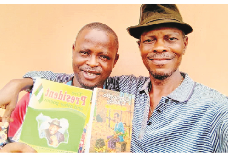 L-R: Author, Amadi Njoku and CEO Bukkybon Publication company, Blessed Adjekpagbon