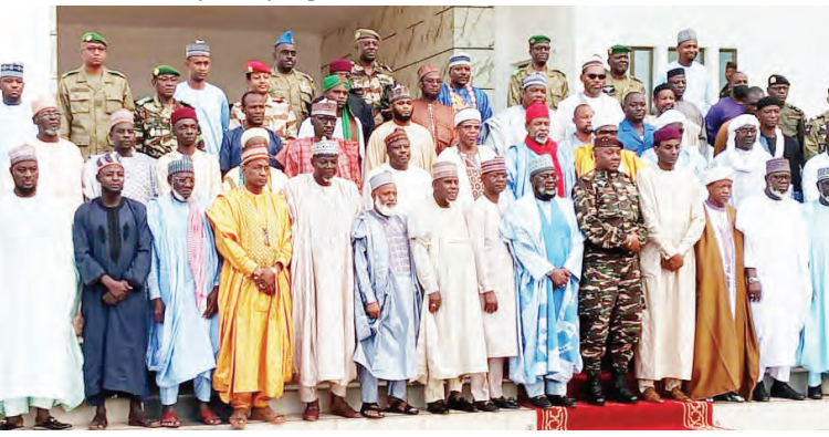 Front Row: The head of the junta, General Abdourahamane Tchiani(5th right); national chairman of Jamatul Izalatu Bida Waikamatu Sunnah, Sheikh Bala 
Lau(6th right) and Islamic scholars, when the Nigeria’s intervention team, consisting of prominent Islamic scholars across Nigeria led by Sheikh Bala Lau, met 
with the junta leader in Niamey, at the weekend