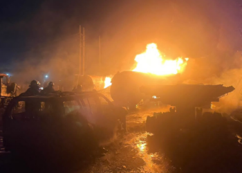 JUST-IN: Fire Outbreak As Residents Scoop Fuel From Fallen Tanker In Lagos