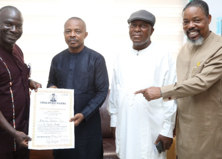 L-R: National president of MOUN, Com. Julius Bobi; NLC president, Com. Joe Ajaero; national treasurer of MOUN, Com. (Chief) Solomon Chukwu, and NLC general secretary, Com. (Barr) Emma Ugbogbaja, at an affiliation meeting between the two labour unions in Abuja.