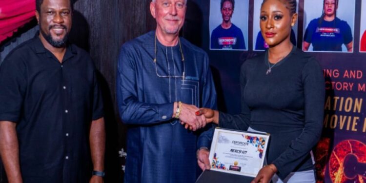 L – R: Col Felix Alaita (rtd); Philippe DELANGHE - officer in charge of UNESCO regional office Abuja; and Mercy Izi