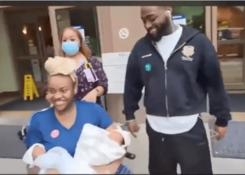 davido and chioma step out of hospital with twins