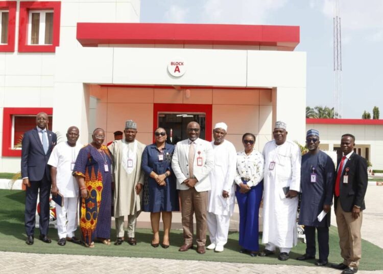 EFCC zonal commander, Michael Nzekwe with heads of tertiary institutions from Kogi and Kwara States during a round table discussion at the Ilorin, Kwara State's office of the agency. Photo by Abdullahi Olesin, Ilorin.