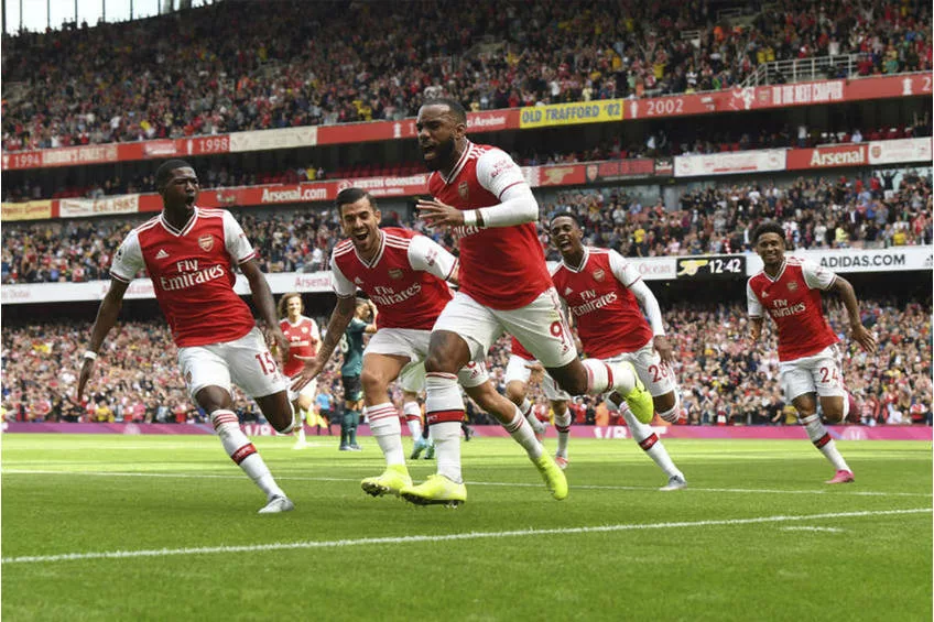 Arsenal move top of Premier League with 2-0 win over Brighton